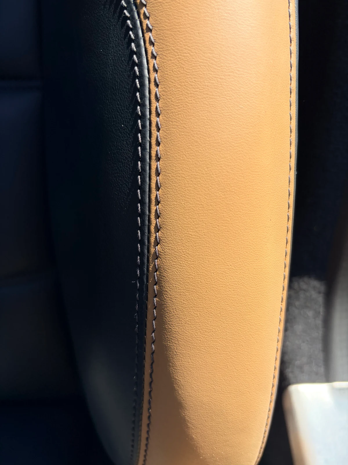 Mercedes-Benz SLS AMG GT Roadster seat bolster after conditioning — surface rehydrated and consistent, original character retained