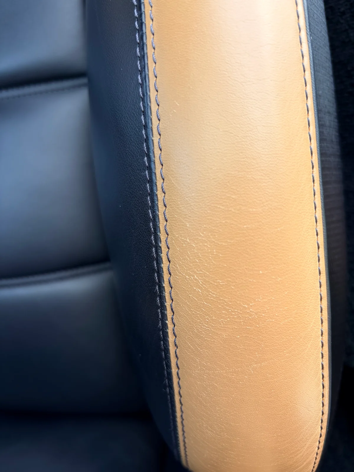 Mercedes-Benz SLS AMG GT Roadster sand leather seat bolster before preservation — fine surface drying visible