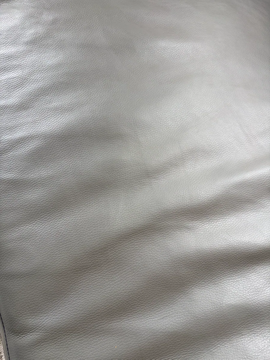 Leather sofa seat after deep cleaning and finish restoration in Brooklyn