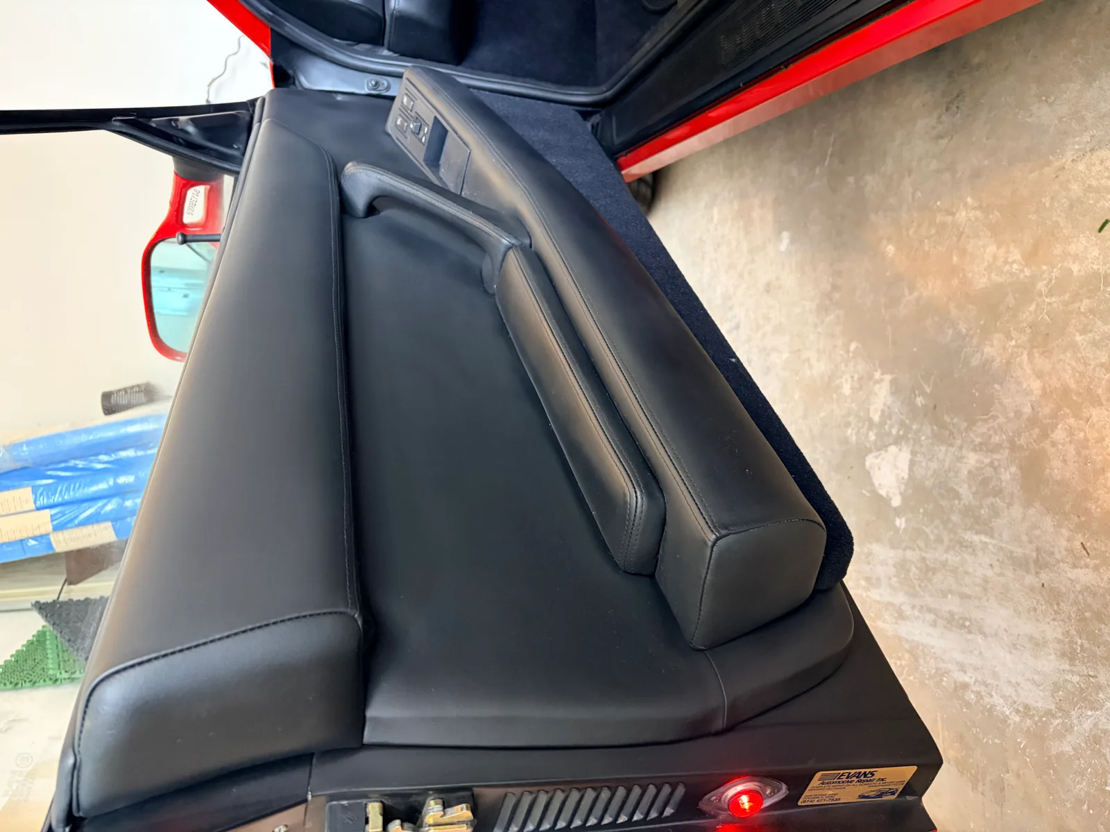 Ferrari 512 TR driver door panel restoration — leather wear corrected and colour blended
