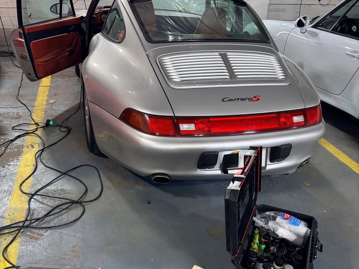 Porsche 993 Carrera S silver exterior rear 3/4 — leather interior restoration case study by Leather & Vinyl Care NJ