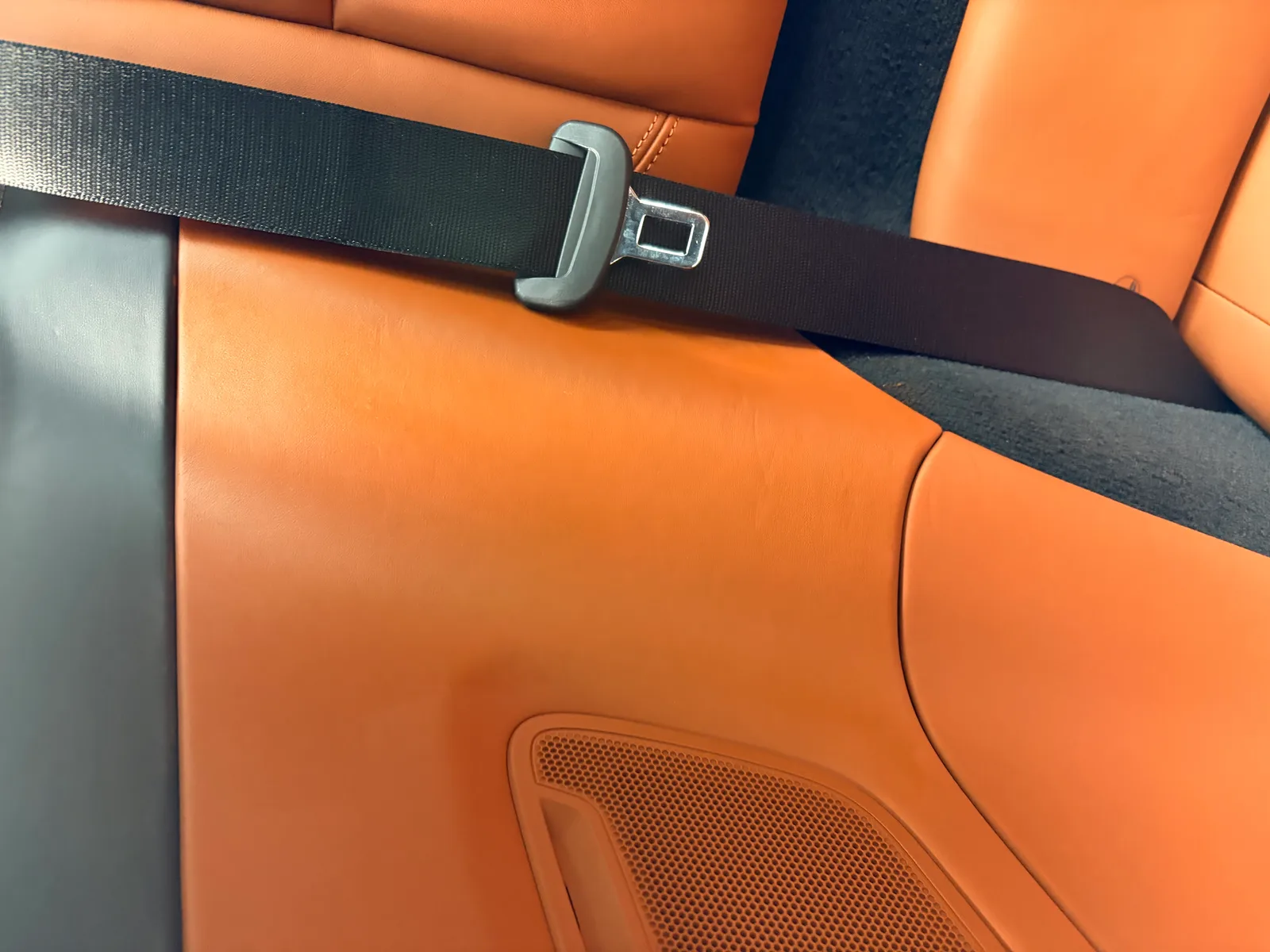 Porsche Cognac leather side panel after restoration by Atlantic Leather Care Manhattan