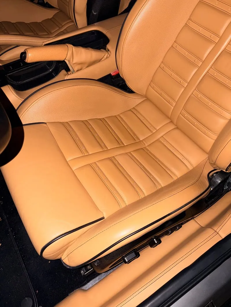 Luxury sports car tan leather interior fully restored by Leather and Vinyl Care NYC