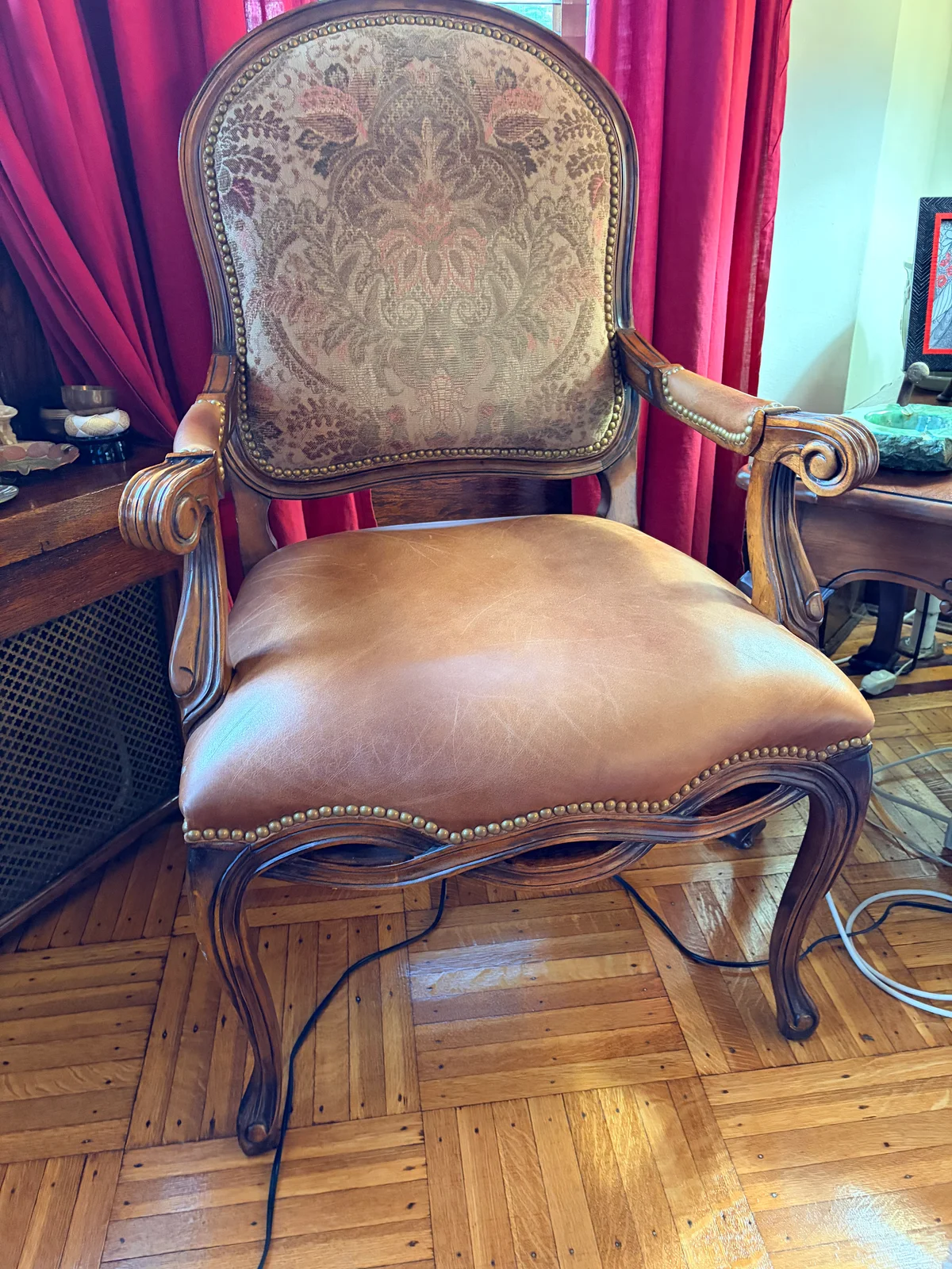 Dining chair seat cushion after foam replacement in Brooklyn — cushion sitting high and properly supported, original upholstery retained